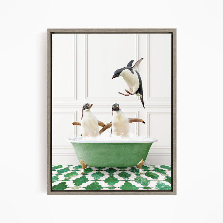 A framed image depicting two penguins sitting in a green bathtub, with one penguin flying towards the other in mid-air.
