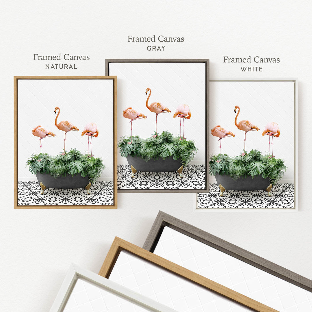 three framed pictures of flamingos in a green plant, each with a different frame color: natural, gray, and white.