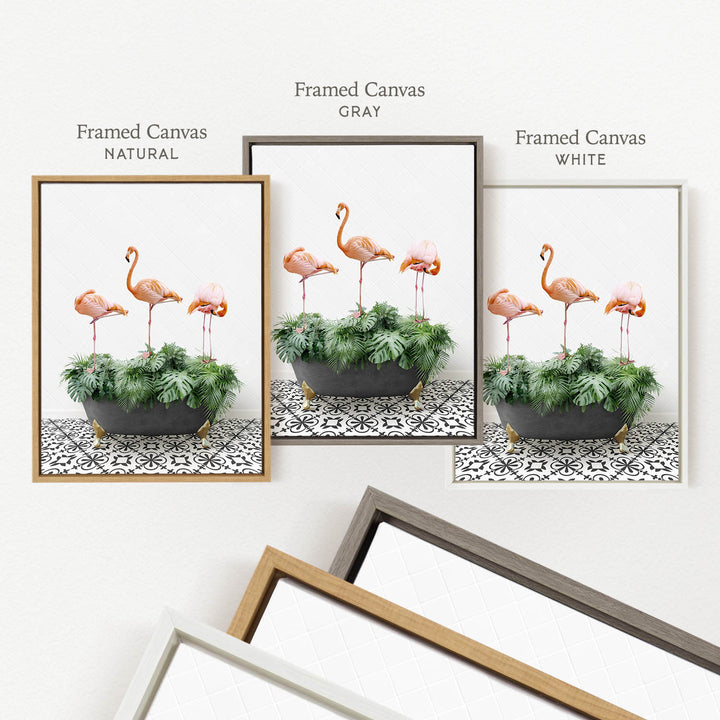 three framed pictures of flamingos in a green plant, each with a different frame color: natural, gray, and white.
