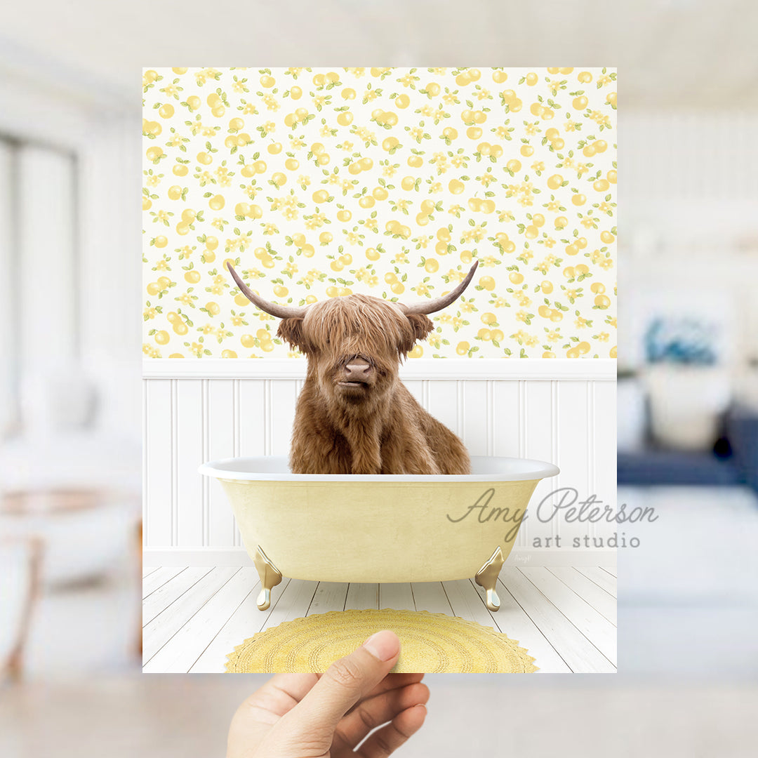 a hand holding up a card with a picture of a cow in a bathtub