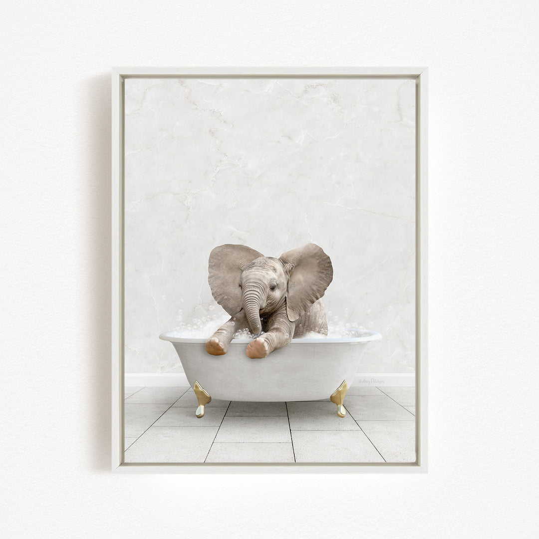 A baby elephant sitting in a white bathtub filled with water, surrounded by a white marble-like background.
