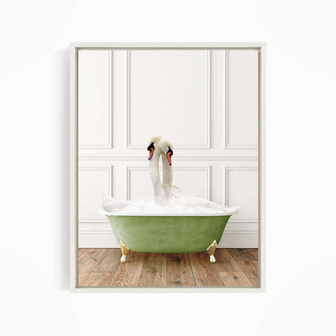 A pair of swans standing in a green bathtub filled with water, creating a whimsical and playful scene.
