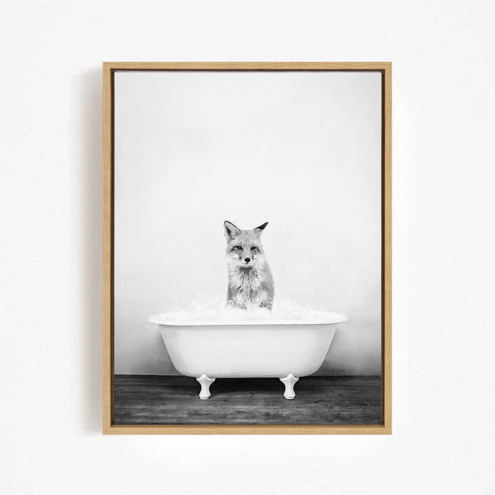 A fox is sitting in a white bathtub filled with water, creating a whimsical and playful scene.