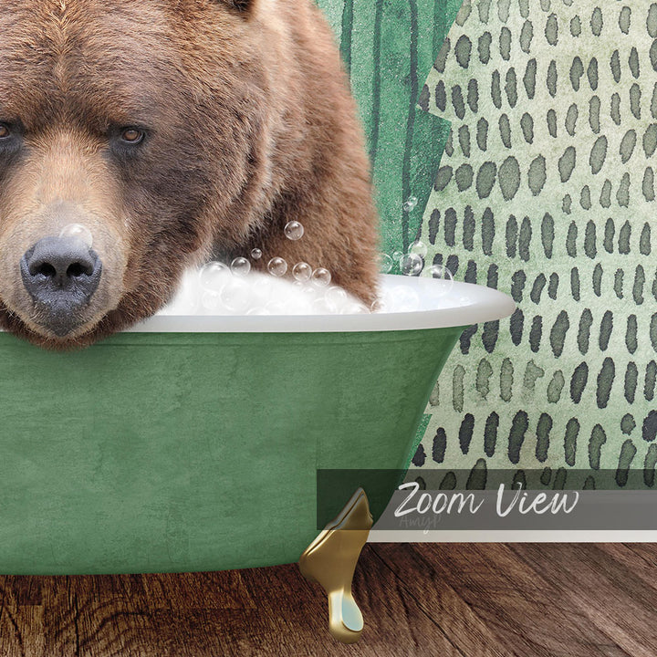 A brown bear is sitting in a green bathtub filled with bubbles, with a patterned wall in the background.