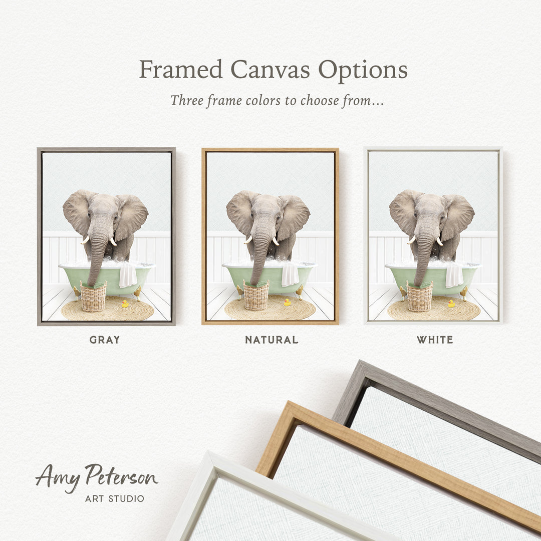 The image is a framed canvas option showcasing three different color options for a painting of an elephant in a bathtub.