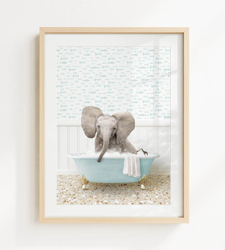A baby elephant sitting in a blue bathtub filled with water, surrounded by a patterned wall and a window.