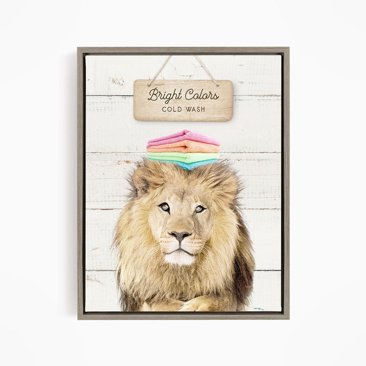 A framed image of a lion with a sign above it that says "Bright Colors Cold Wash".