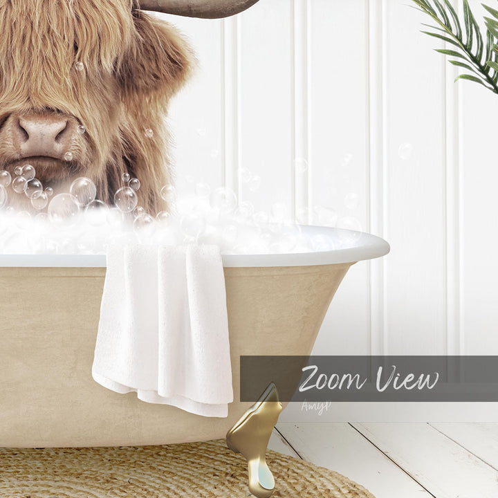 A close-up of a cow's head in a bathtub filled with bubbles, with a towel and a gold object nearby.