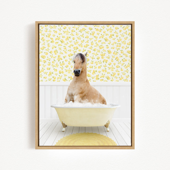 A brown horse sitting in a white bathtub filled with bubbles, surrounded by a yellow floral pattern on the wall.