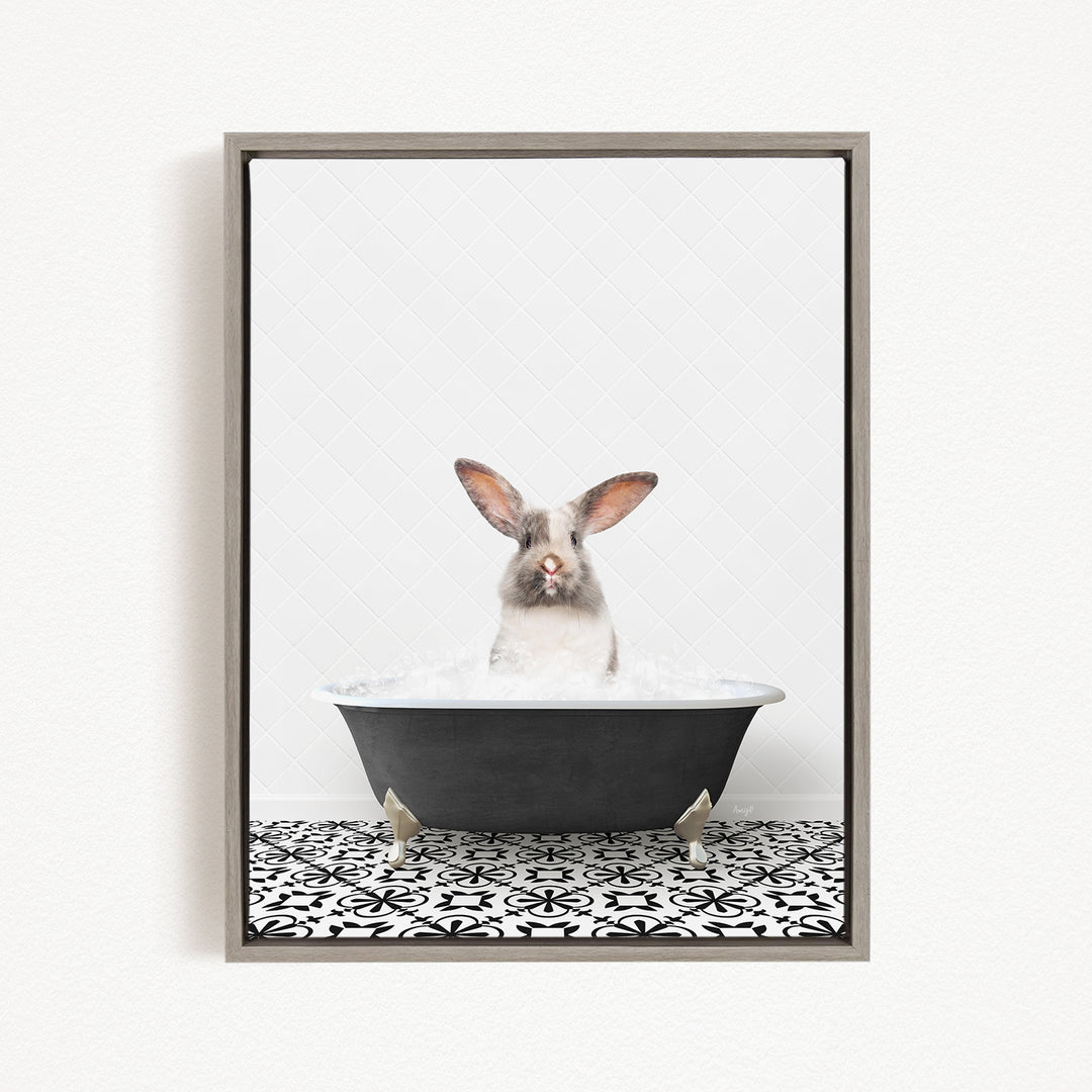 A white rabbit sitting in a black bathtub filled with water, with a black and white patterned floor beneath it.