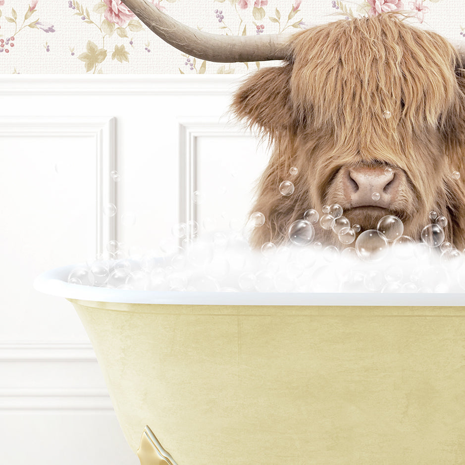 a bull with long horns sitting in a bathtub filled with bubbles