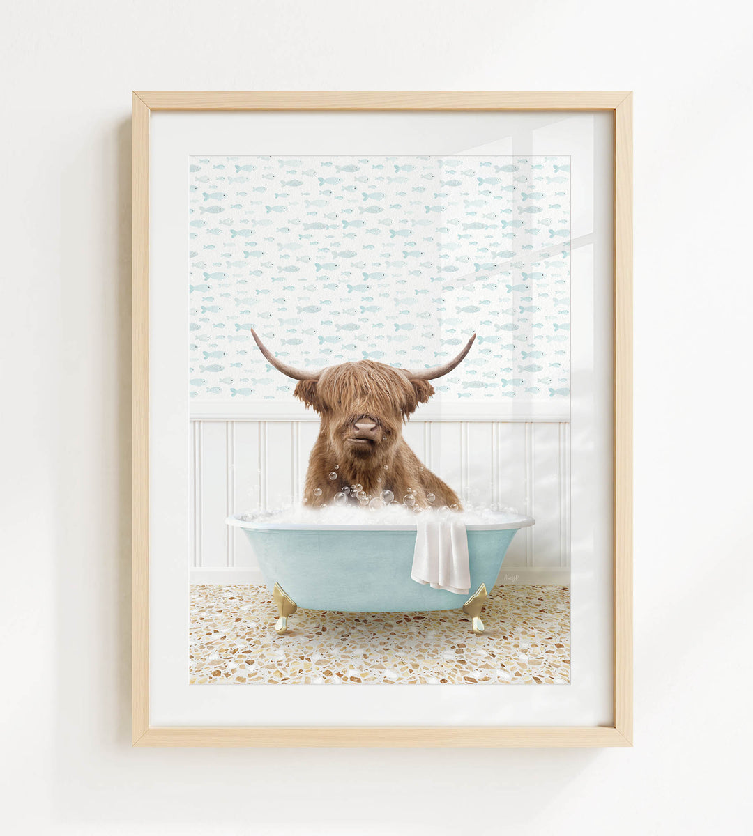 A brown cow with long horns is sitting in a blue bathtub filled with bubbles, surrounded by a patterned wall and a white floor.