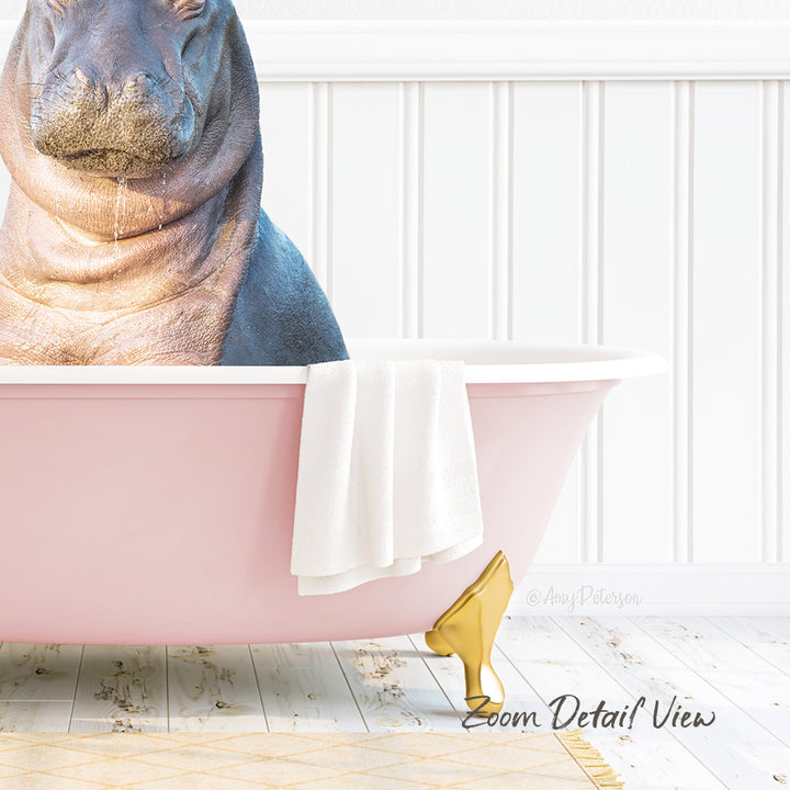 A large, pink bathtub filled with water, with a hippopotamus sitting inside it. The bathtub is placed on a wooden floor, and there is a towel and a gold object next to it.