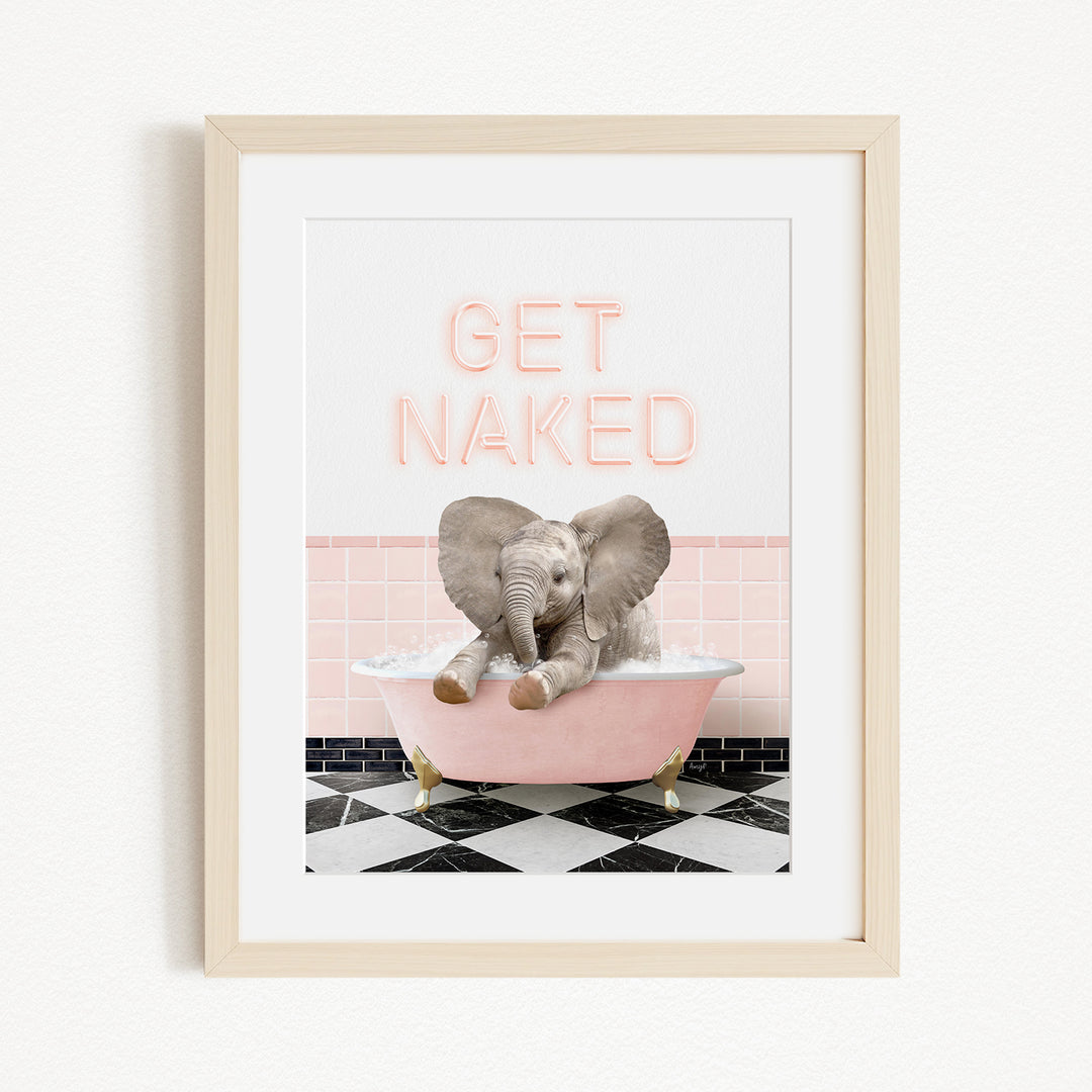 A framed image depicting a baby elephant sitting in a pink bathtub, with the text "GET NAKED" displayed above it.