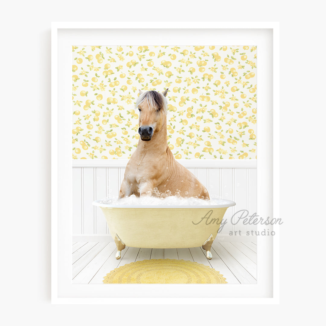 a brown horse sitting in a bath tub