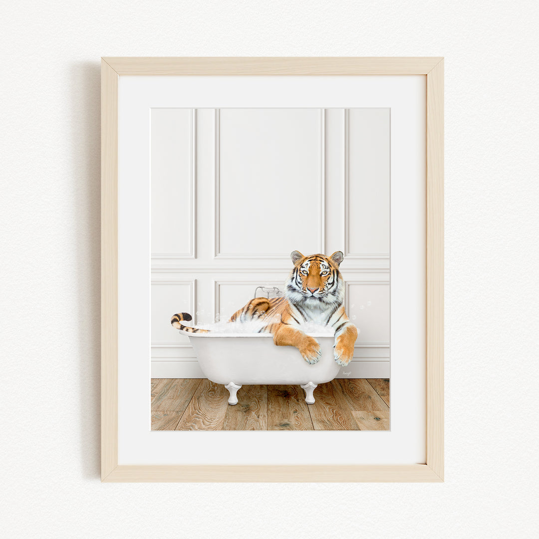 A tiger is sitting in a white bathtub, appearing relaxed and enjoying the bath.