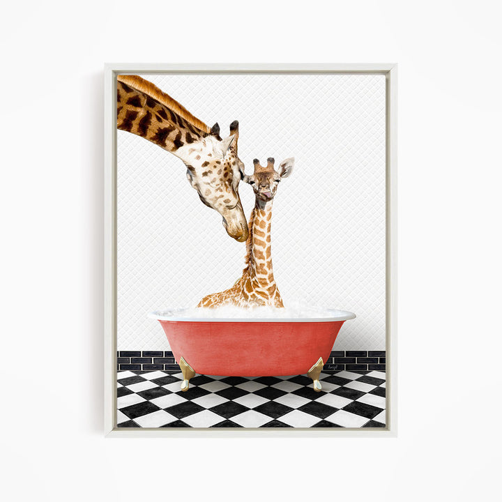 A mother giraffe and her baby giraffe are sitting in a red bathtub filled with water, with the mother giraffe's head dipping into the tub and the baby giraffe sitting next to her.