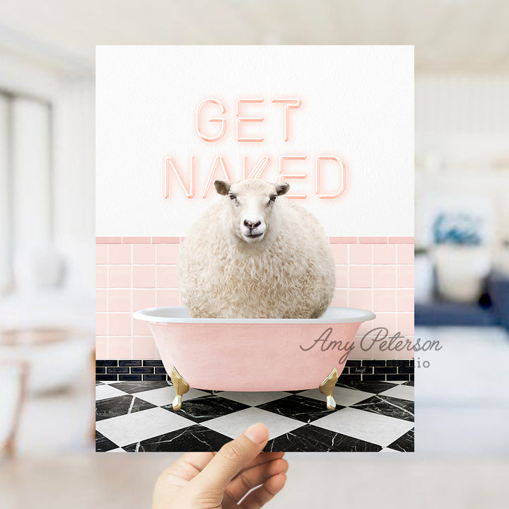 a person holding up a card with a picture of a sheep in a bathtub