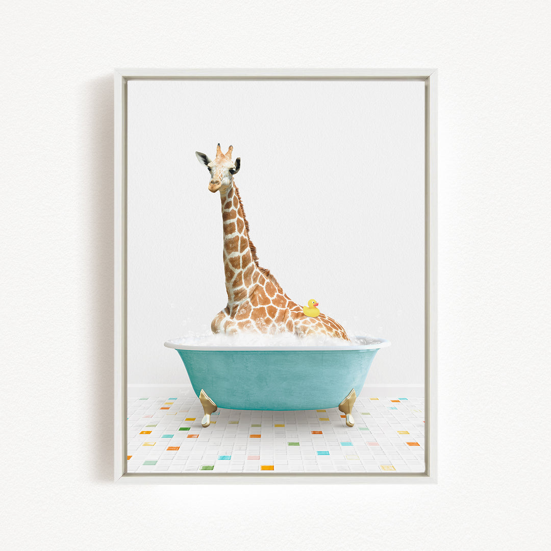 A giraffe is sitting in a blue bathtub filled with water, with a yellow rubber duck floating on the water.