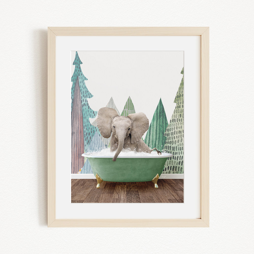 A gray elephant is sitting in a green bathtub, surrounded by a forest-themed background with trees and a snowy landscape.