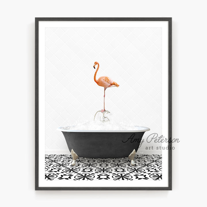 a pink flamingo standing on top of a bathtub