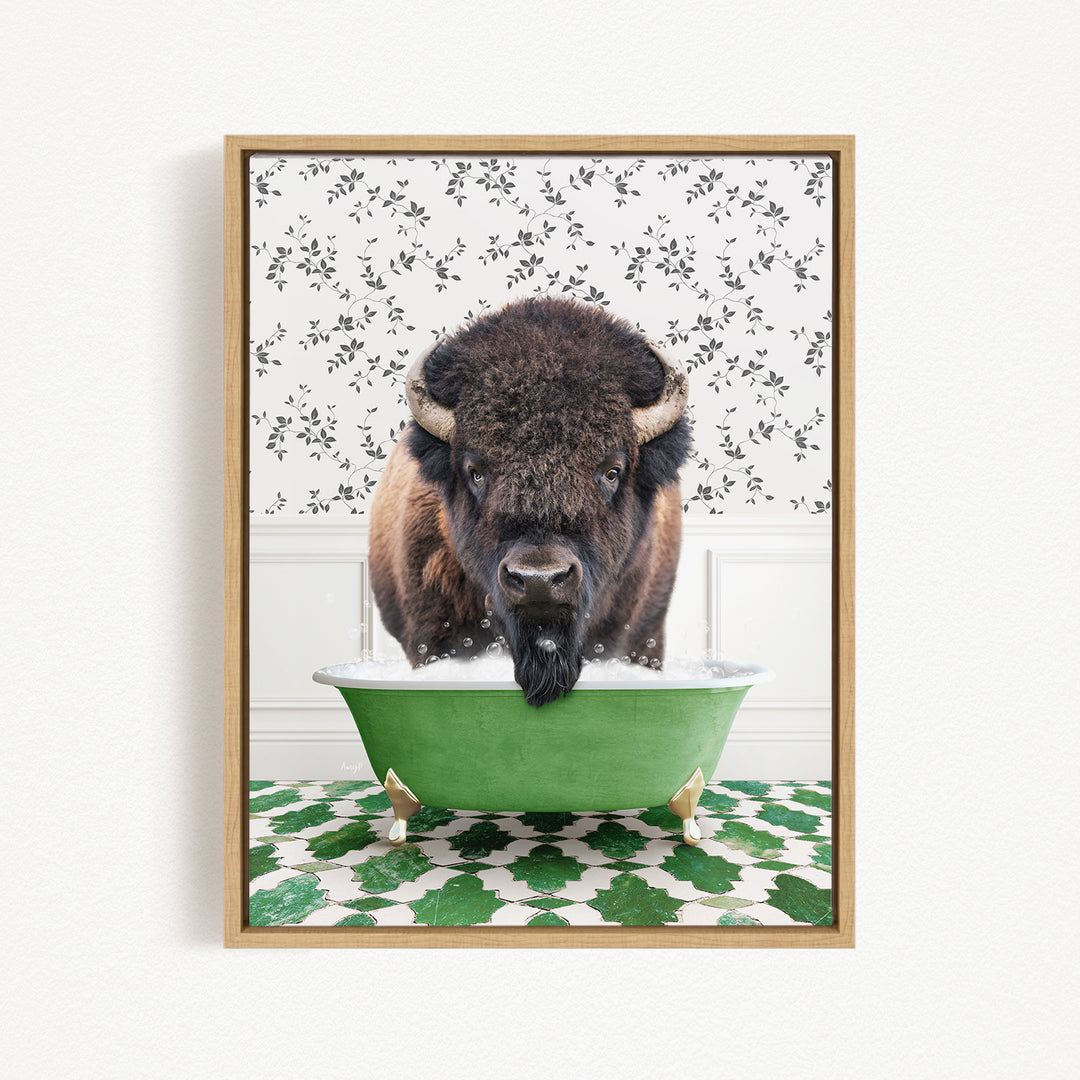 A buffalo with a black mane and horns is standing in a green bathtub filled with water, with a patterned tile floor beneath it.