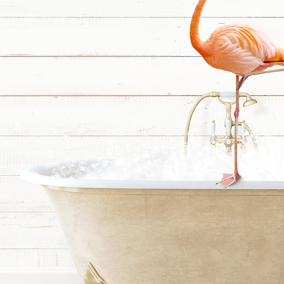 a pink flamingo standing on the edge of a bathtub