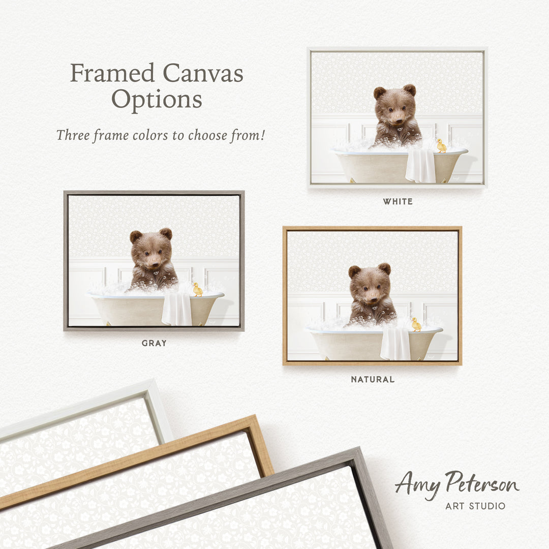 The image is a framed canvas with three different frame options for a picture of a bear sitting in a bathtub. The bear is depicted in various colors, including white, gray, and natural. The image is from Amy Peterson's Art Studio, and it showcases the different frame colors available for the canvas.