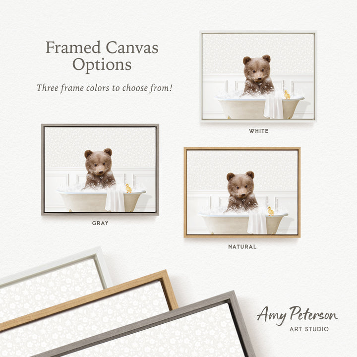 The image is a framed canvas with three different frame options for a picture of a bear sitting in a bathtub. The bear is depicted in various colors, including white, gray, and natural. The image is from Amy Peterson's Art Studio, and it showcases the different frame colors available for the canvas.