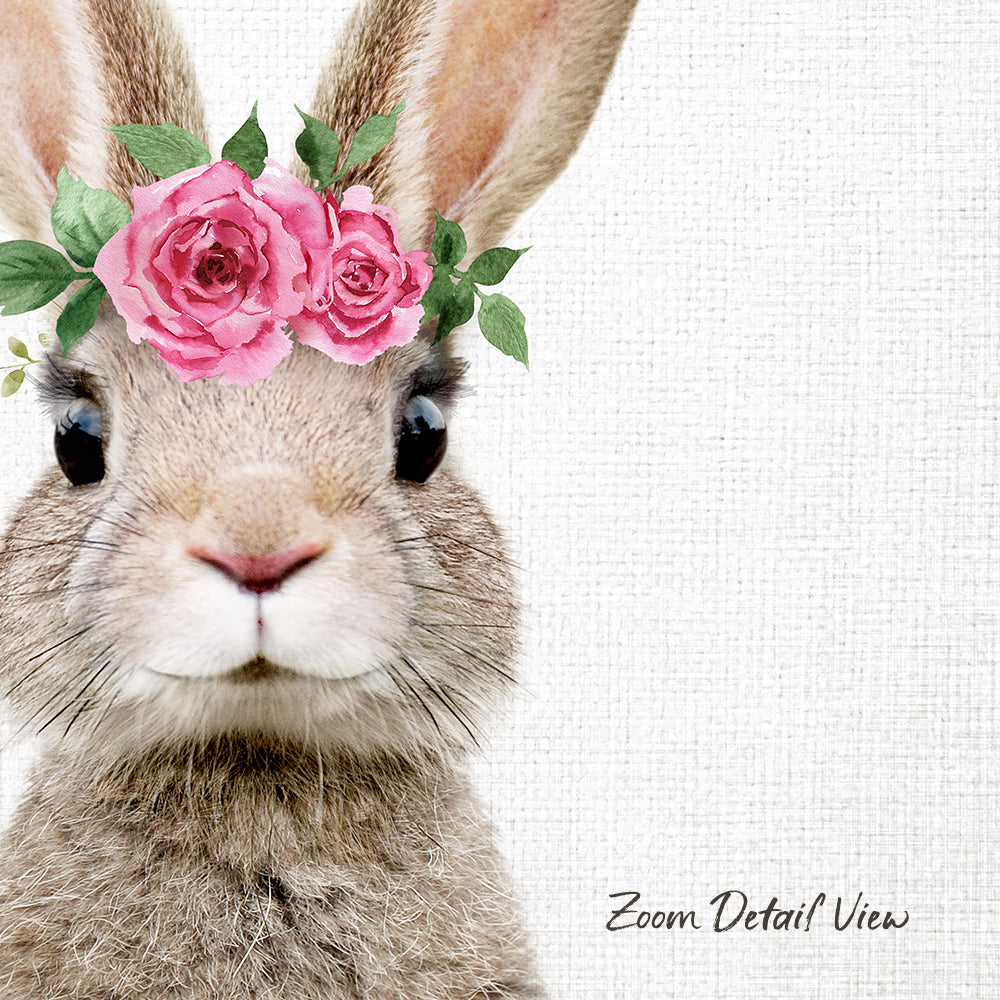 A close-up of a rabbit wearing a pink flower crown on its head, with its eyes and nose visible.