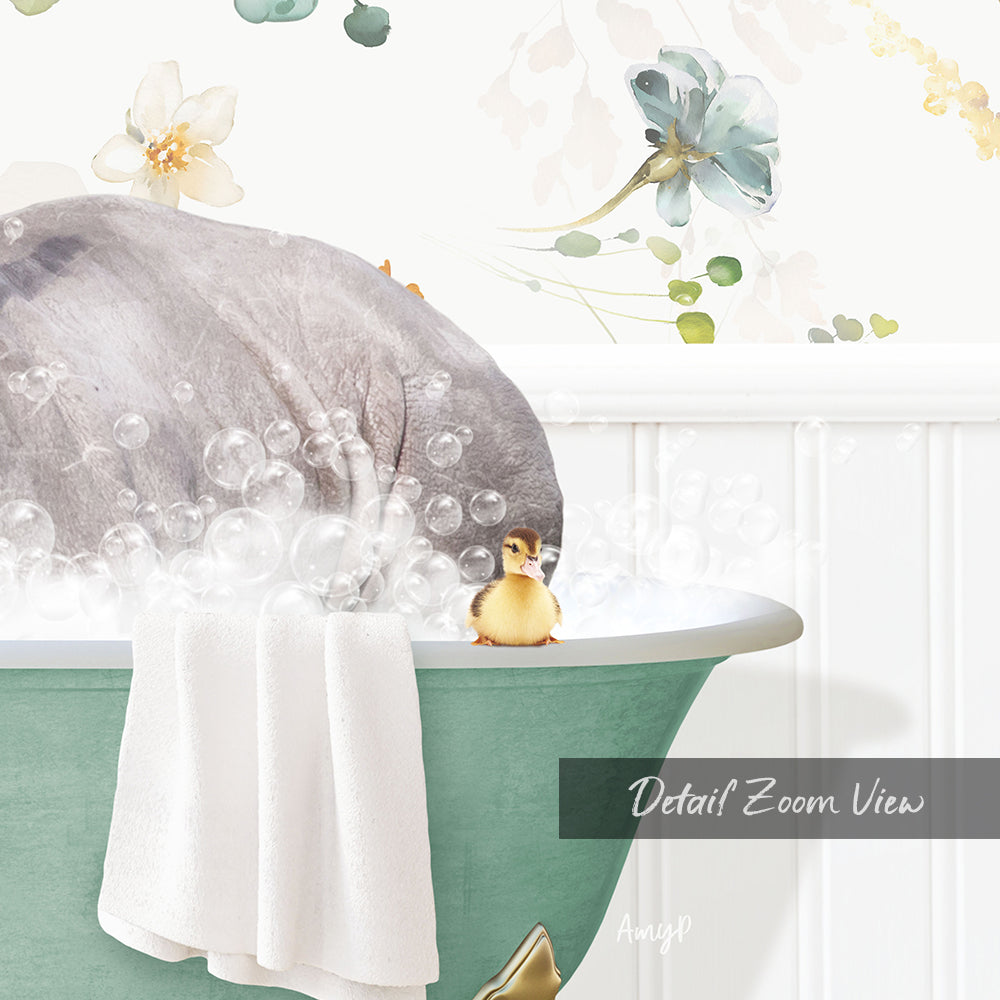 A small yellow duck sitting in a green bathtub filled with bubbles, with a white towel and a flower decoration in the background.
