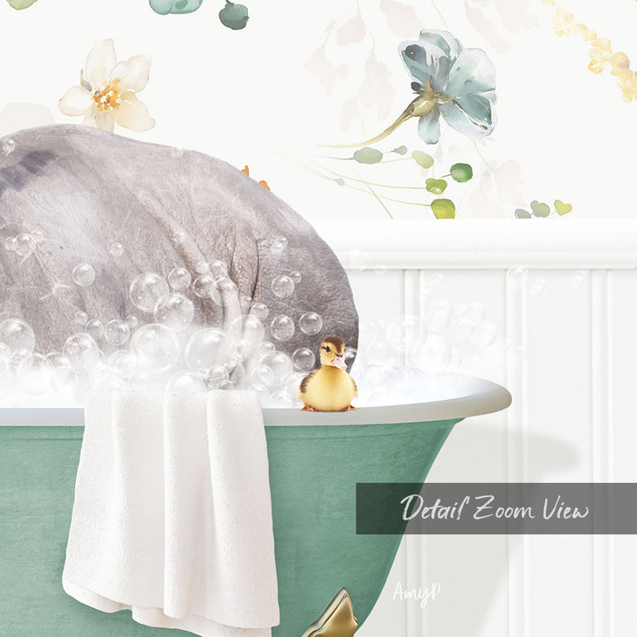 A small yellow duck sitting in a green bathtub filled with bubbles, with a white towel and a flower decoration in the background.