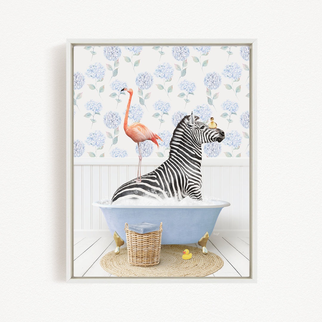 A zebra is sitting in a bathtub filled with water, with a pink flamingo standing on its back and a basket of rubber ducks nearby.