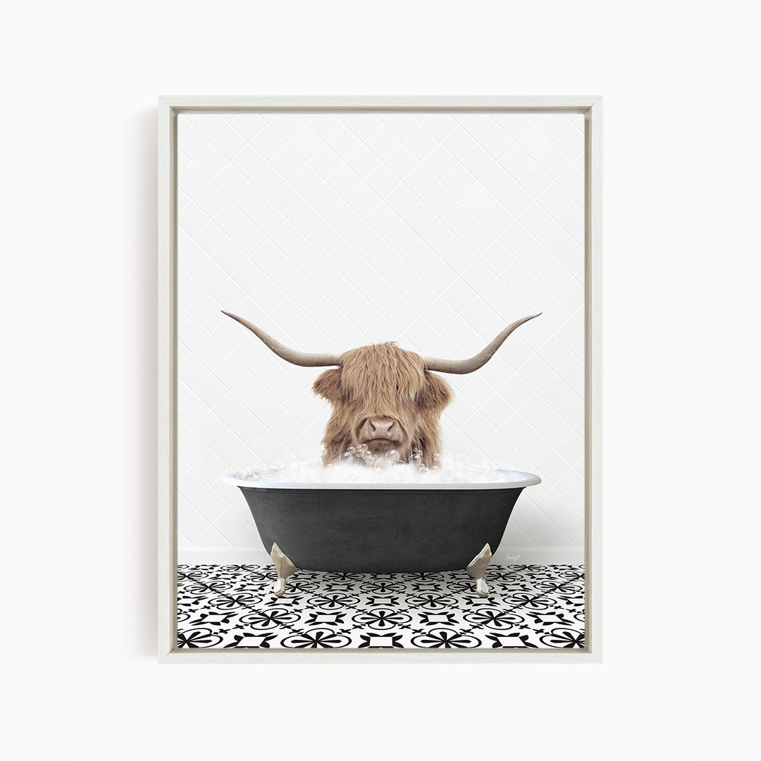A Highland cow with large horns is sitting in a bathtub filled with water, creating a whimsical and humorous scene.