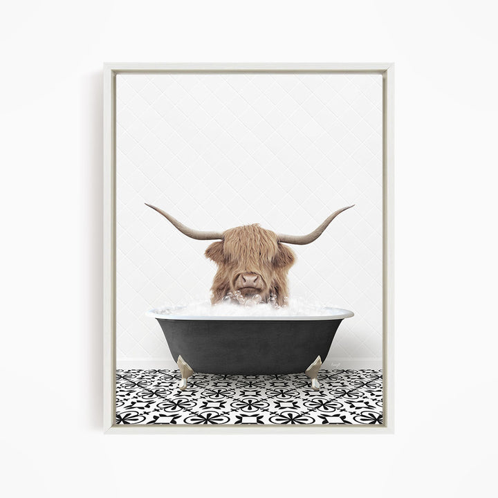 A Highland cow with large horns is sitting in a bathtub filled with water, creating a whimsical and humorous scene.