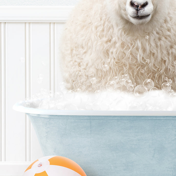 a sheep is sitting in a bathtub with bubbles