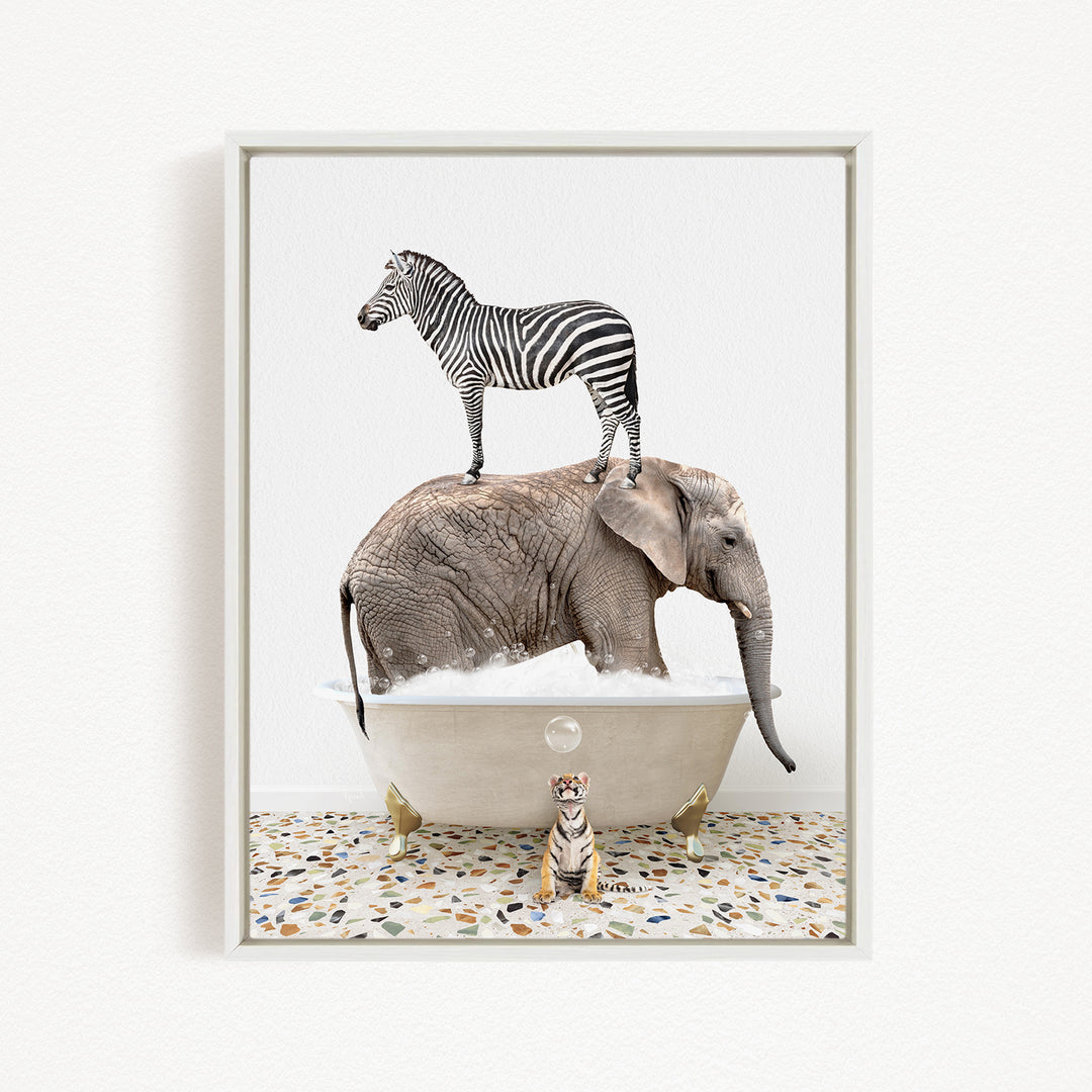 A zebra standing on the back of an elephant, both in a bathtub, with a small tiger figurine in front of them.