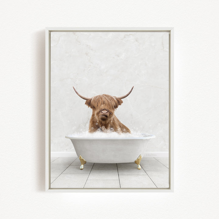 A Highland cow with long horns is sitting in a white bathtub filled with bubbles, creating a whimsical and playful scene.