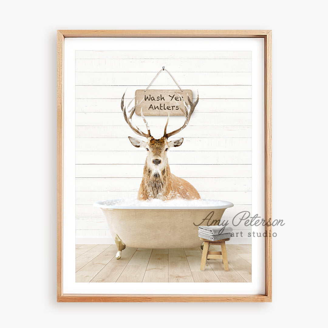 a picture of a deer in a bathtub with a sign that says wash your