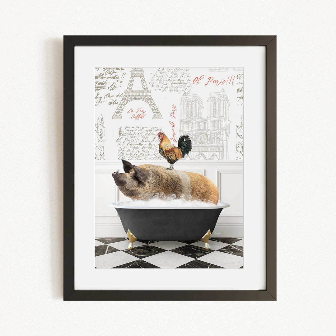 A framed image depicting a pig sitting in a bathtub, with a rooster perched on its back, against a backdrop of the Eiffel Tower and other Parisian landmarks.