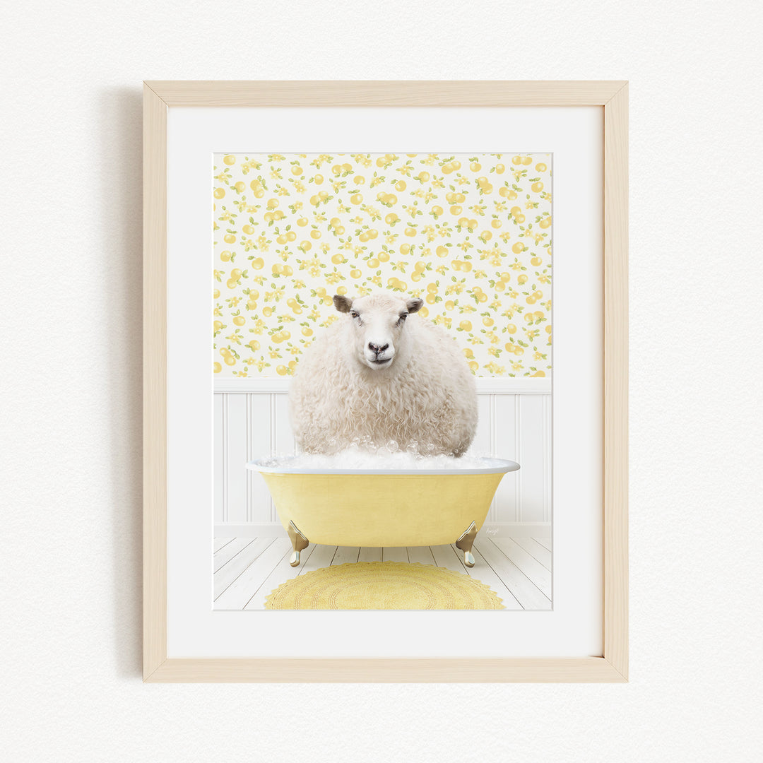 A fluffy white sheep sits in a yellow bathtub, surrounded by a yellow floral wallpaper.