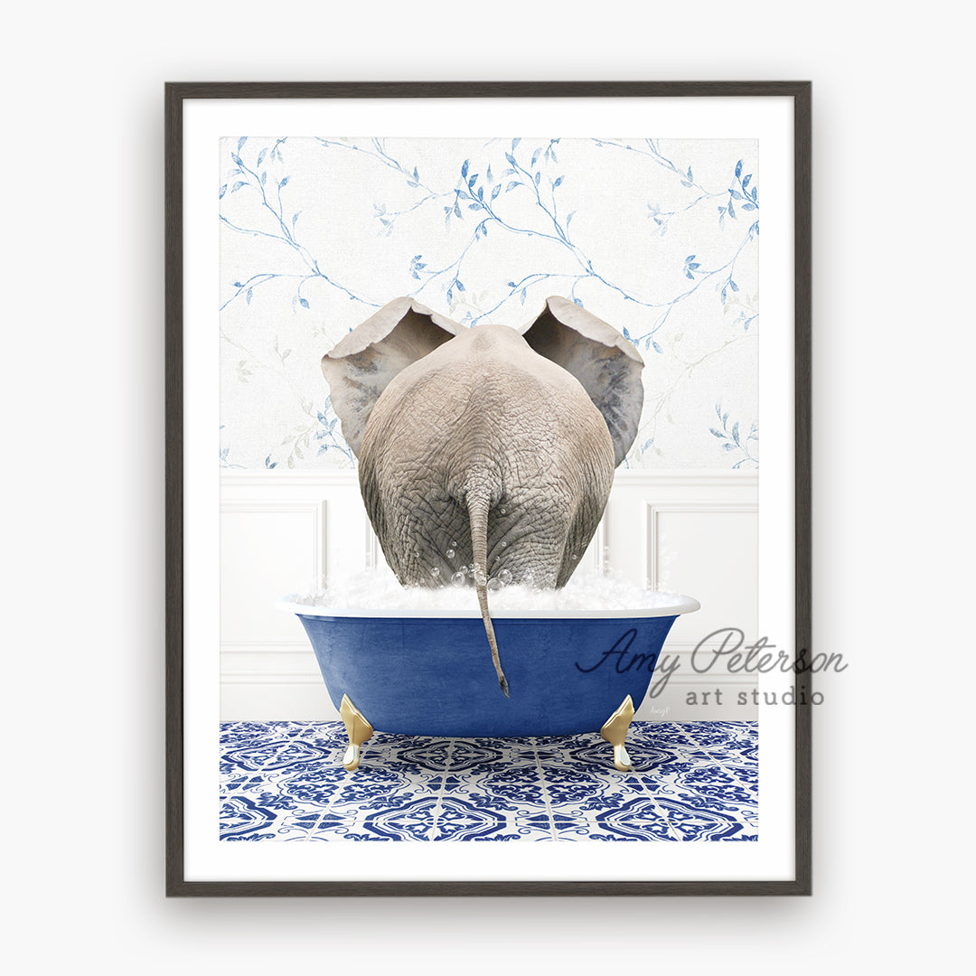 a picture of an elephant taking a bath