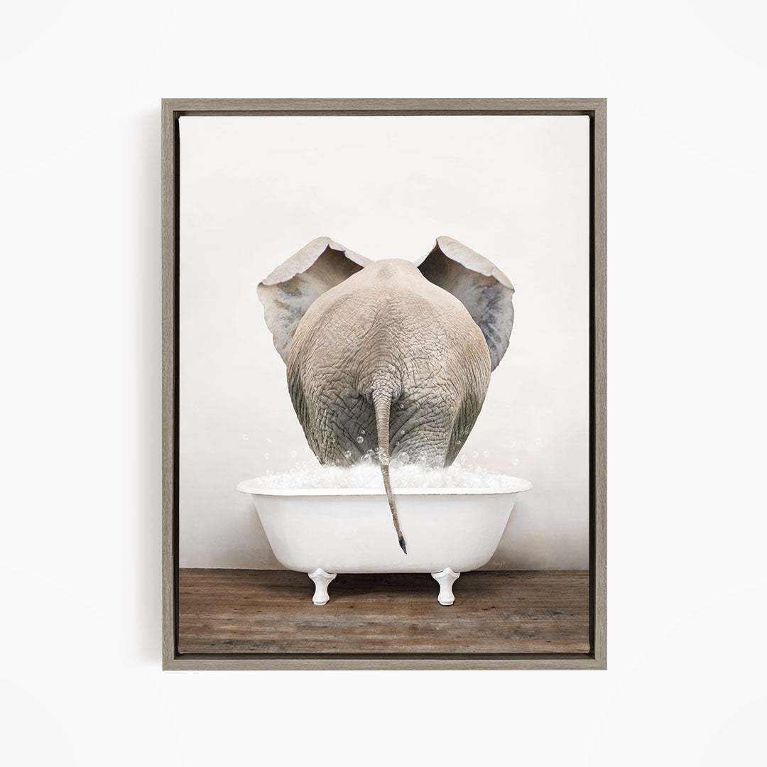 A gray elephant is standing in a white bathtub filled with water, with its back turned to the viewer.