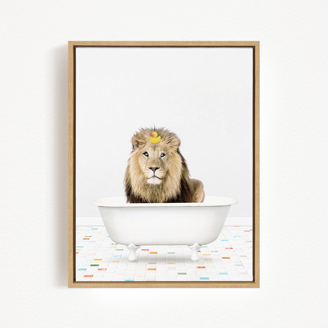 A lion sitting in a white bathtub, with a yellow rubber duck floating on its head.