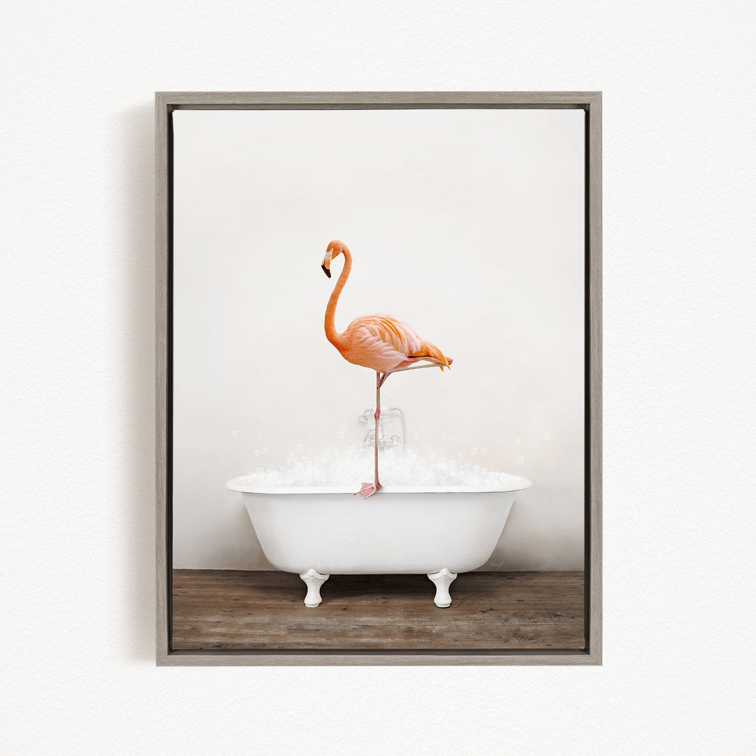A vibrant orange flamingo stands on the edge of a white bathtub, creating a whimsical and playful scene.