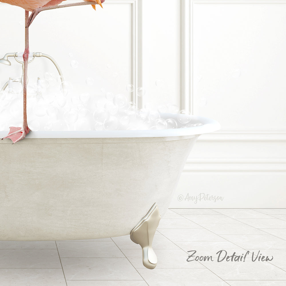 A white claw-foot bathtub filled with bubbles, with a pink bird perched on the edge.