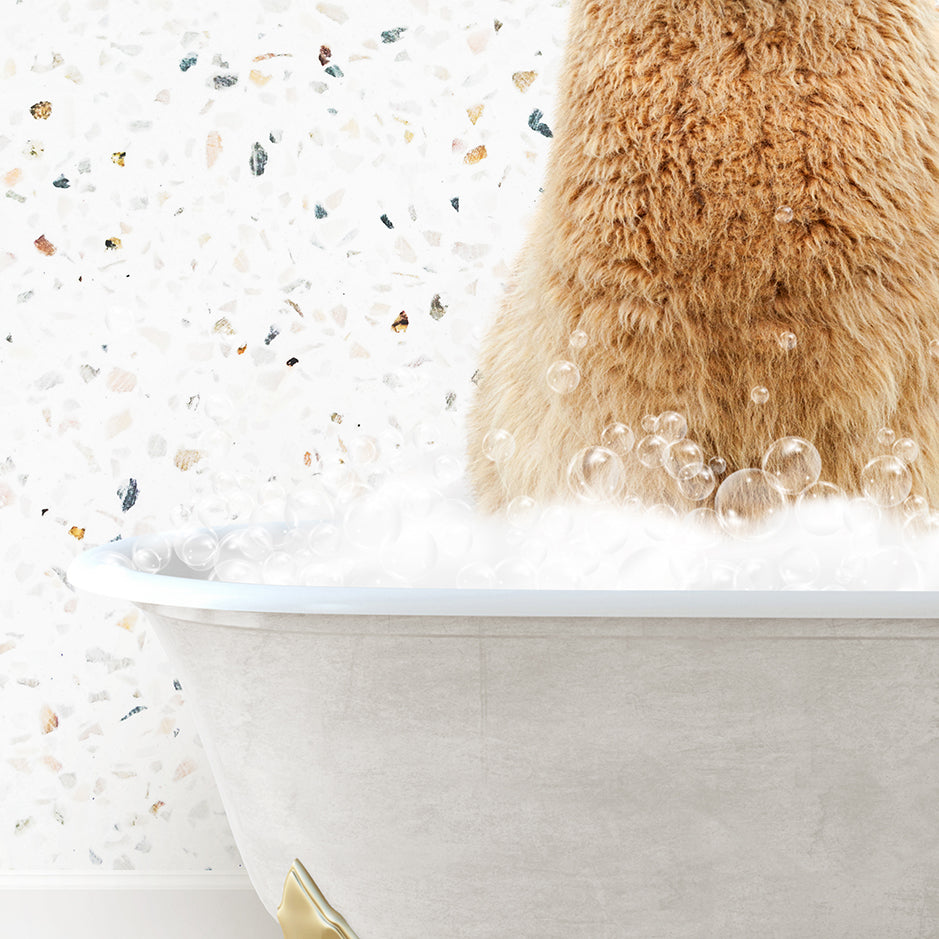 a brown bear sitting in a bathtub filled with bubbles