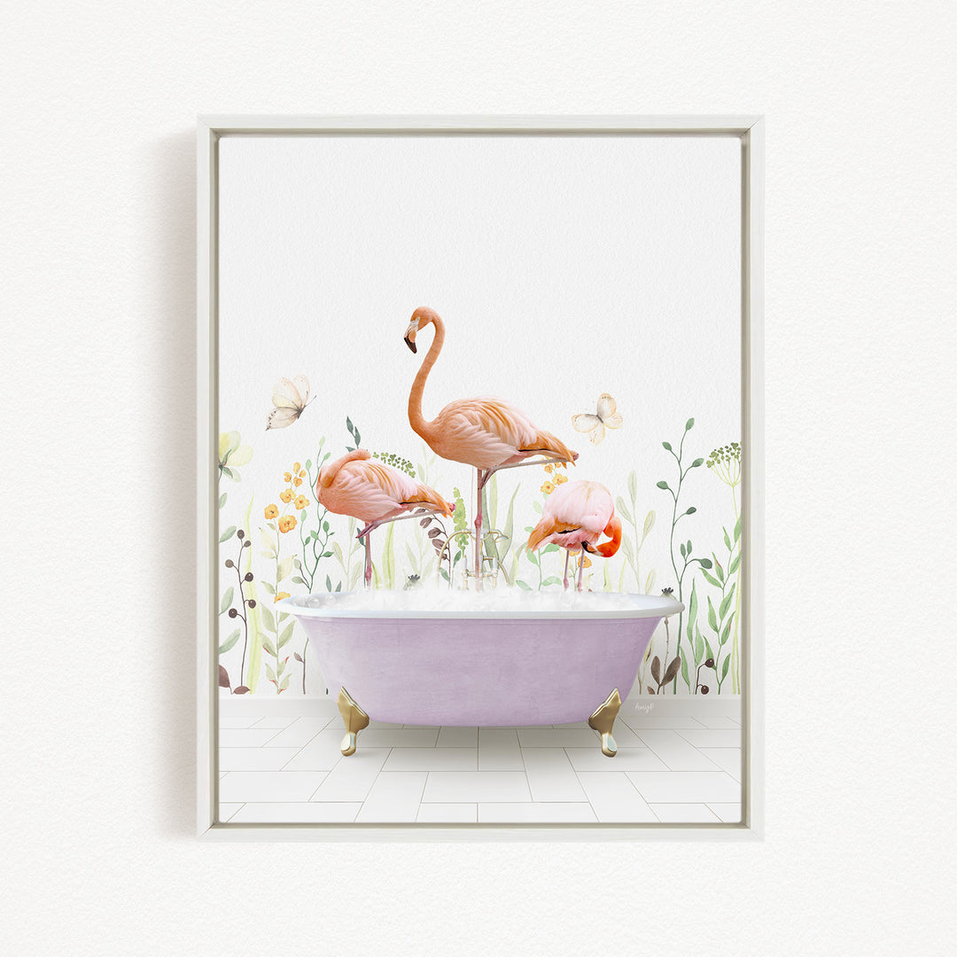 A framed illustration depicting three flamingos standing in a bathtub filled with water, surrounded by flowers and butterflies.