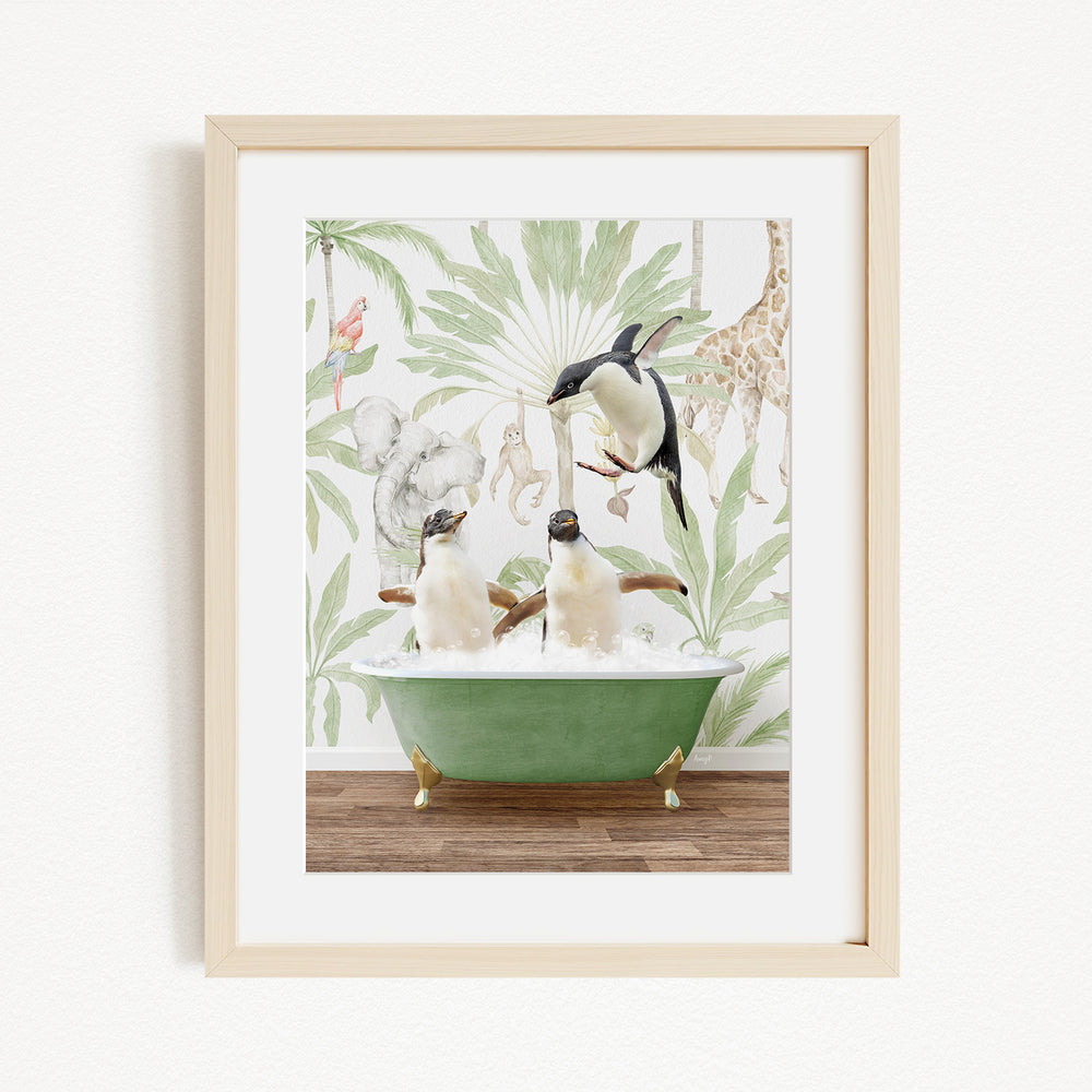 A framed image depicting three penguins sitting in a green bathtub, surrounded by a tropical jungle wallpaper.