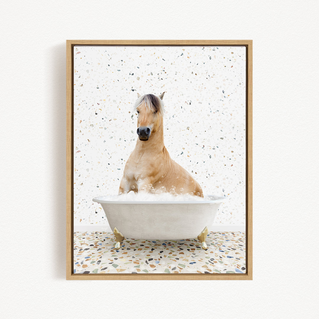 A horse sitting in a white bathtub filled with bubbles, surrounded by a speckled pattern on the floor.
